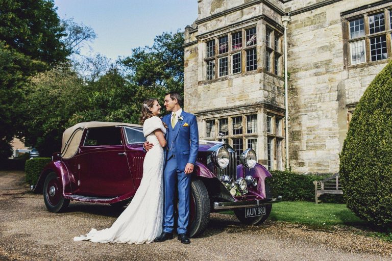 23119f6f 9f90 4944 a869 0edc529fed3d Haremere car and couple 1 768x512