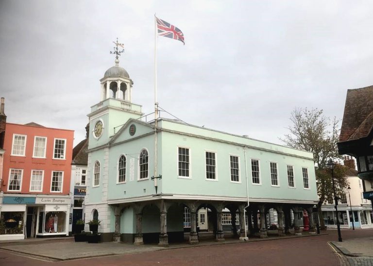 AdamsGHPicturewithflagEdit2 768x548