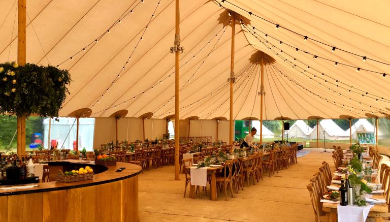 Bignor Park Weddings Crocket Lawn Marquee interior 2700x1536 1 768x437