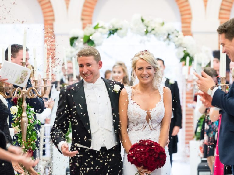 BrideandGroomwalkingdowntheAisle 768x576