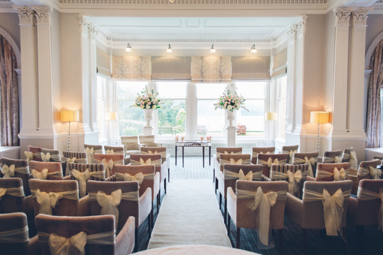 CeremonySetup Restaurant AddedDecorandChairSashes 768x512