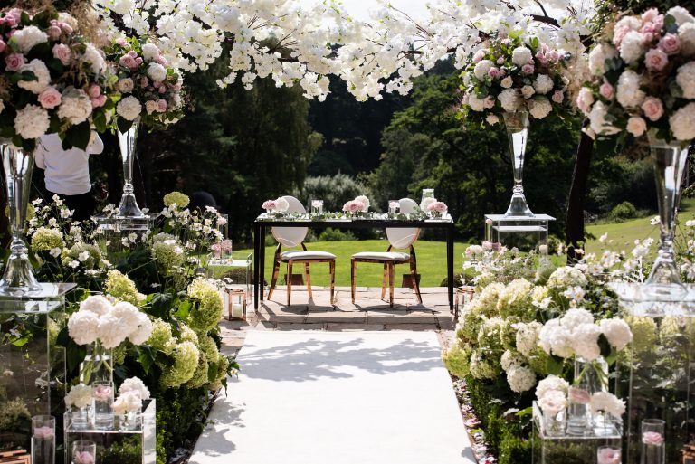 DelamereManorWedding terrace OutdoorCeremony closeup CarolineWhite DaleAlexanderEvents 768x513