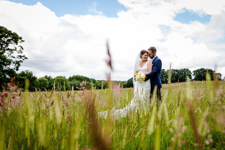 Emma and Matt in the Marquee Meadow at Monks fif8xi 768x512