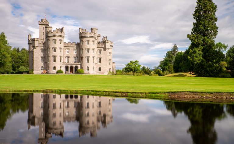 MOGExteriorwithPond scaled 768x472