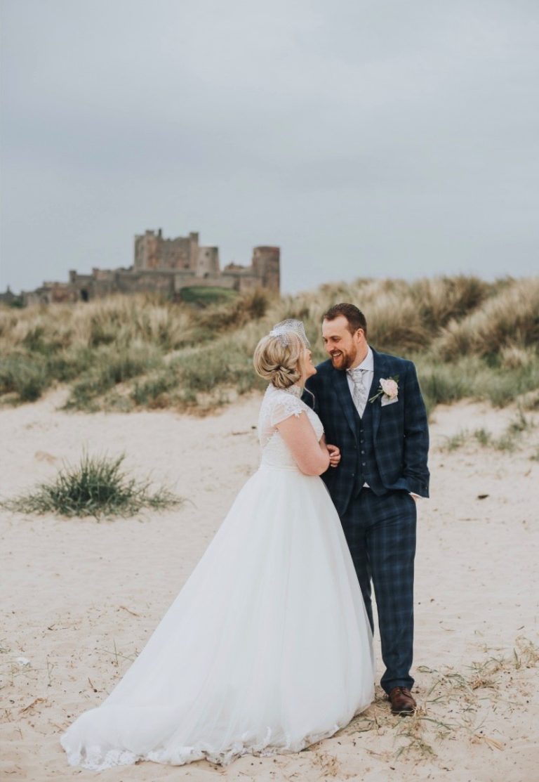 NatandPaulonbeachwithcastle 768x1113