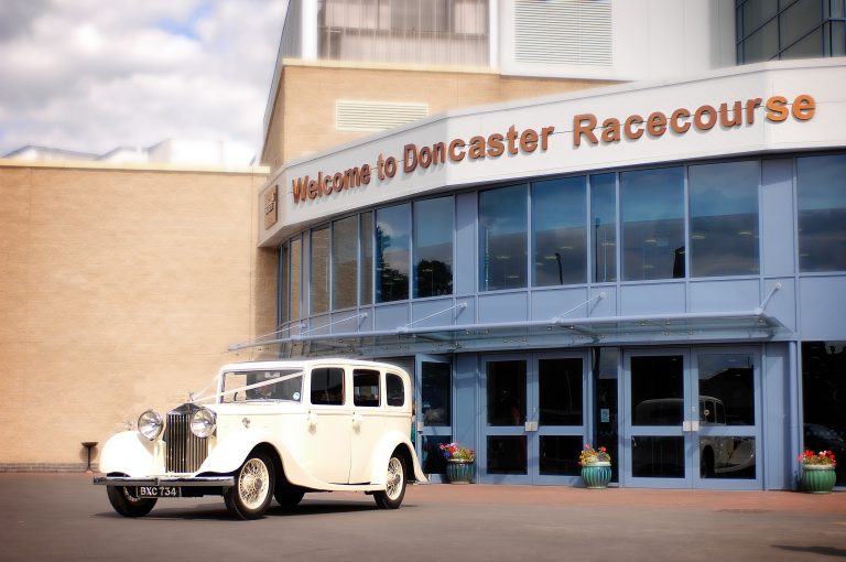 Weddingcaroutsidemainentrance 768x510