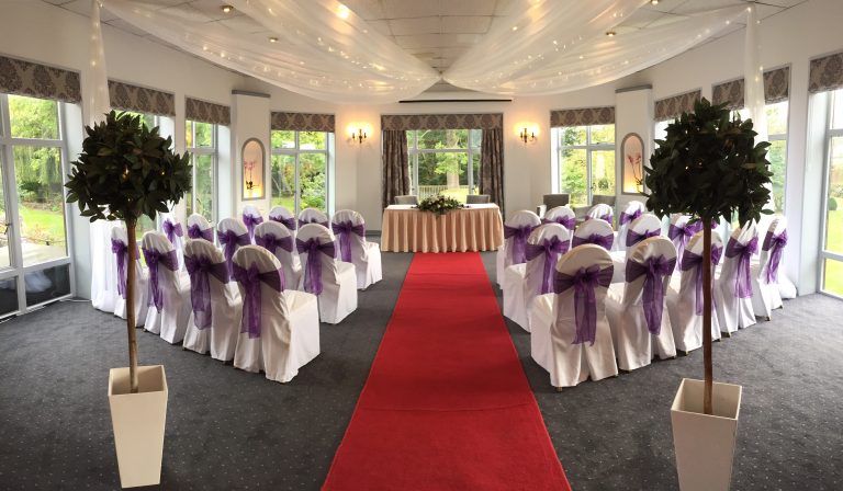 a8668bba bddc 4e2b b7d4 891d966d2bca Garden Suite purple ceremony swaging1 768x448