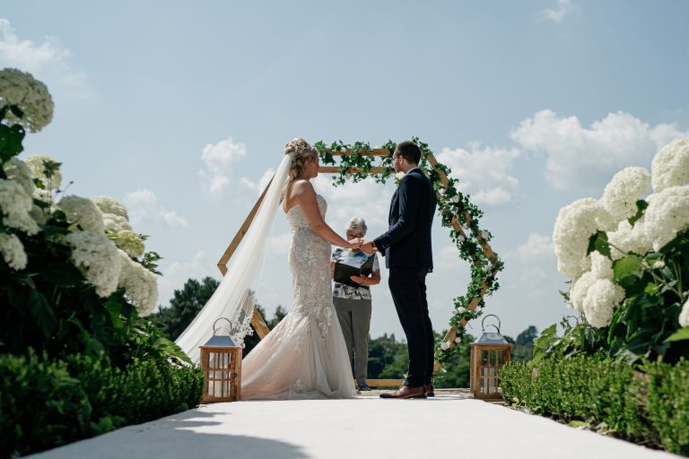 brideandgroomceremonylowangleshotdowntheaisle andygriffiths 768x512