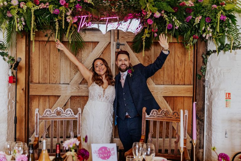coupleattoptablepinkflowerswillowandbloomneonsign1 768x512
