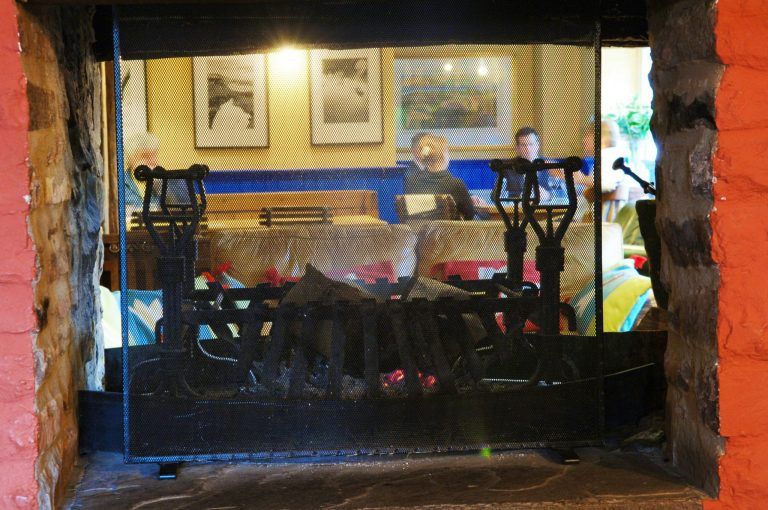 feelin fach griffin 2008   griffin through fireplace scaled 768x510