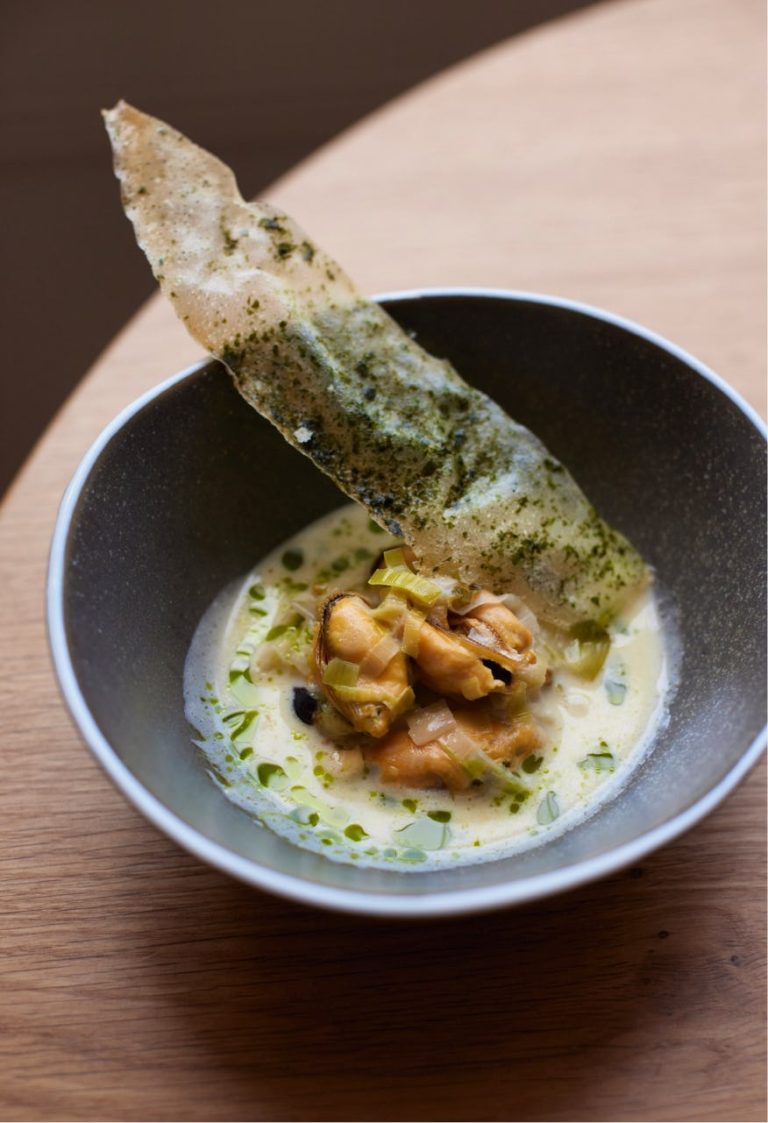 holm review 21112023023618 768x1123