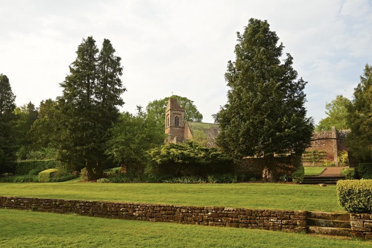melmerbychurchspirerisingabovethegarden Copy 768x512