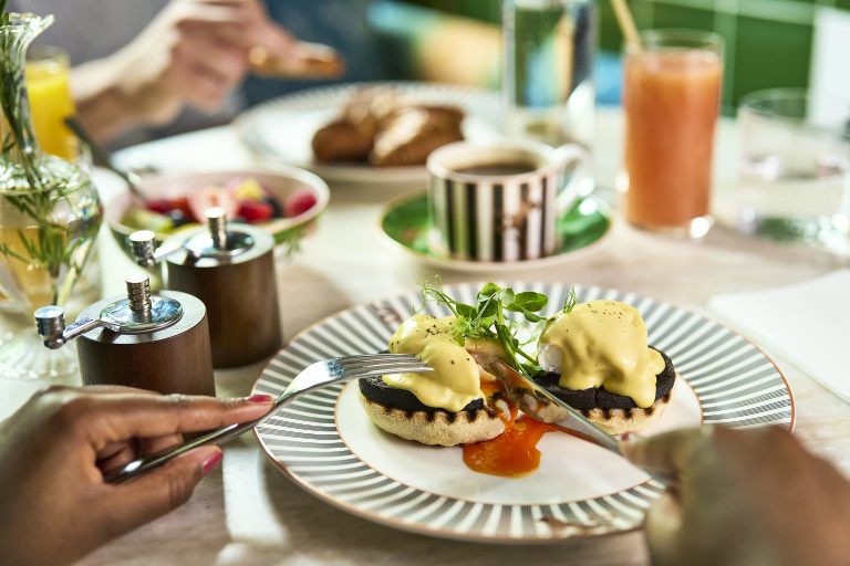 tok alldaydishes brunch blackpuddingbenedict 2605242 04072024112412 768x512